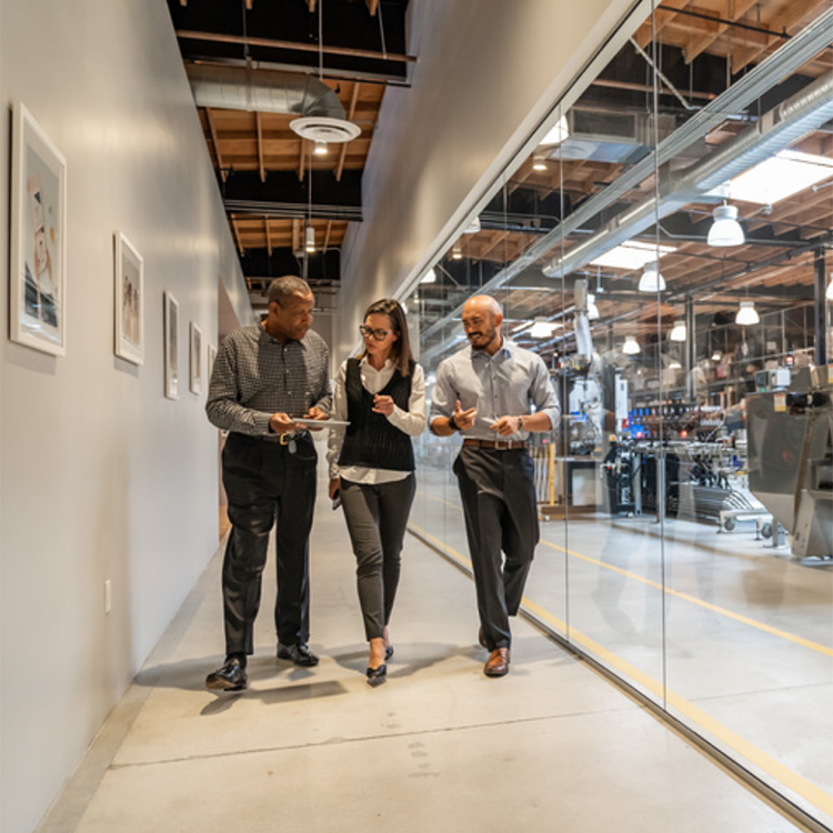 Accelerate - people walking in office